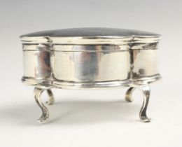 An Edwardian silver trinket box, Elkington & Co Ltd, London 1904, the quatrefoil hinged cover