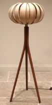 A Tom Raffield tripod floor lamp, the 'urchin' shade upon three splayed stained beech wood supports,