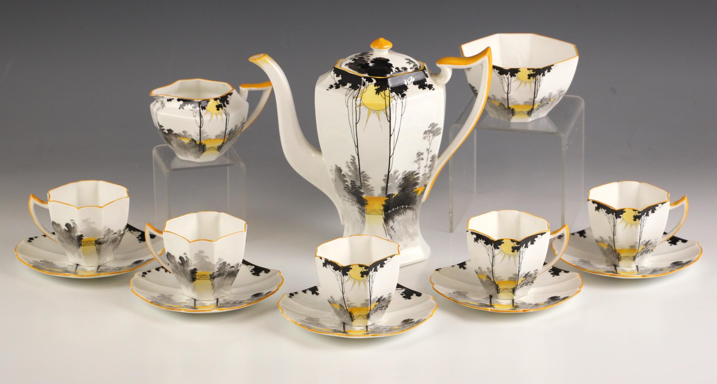 A Shelley Art Deco 'Queen Anne' shape part coffee service in the 'Sunset And Tall Trees' pattern,