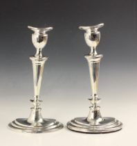 A pair of George V silver candlesticks, Jenkins & Timm, Sheffield 1923, the oval removeable drip