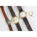 A group of four wristwatches, including a Waltham yellow metal cased example, the circular white