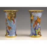 A pair of Carlton Ware lustre vases in the 'Paradise Bird and Tree with Cloud' pattern, early 20th