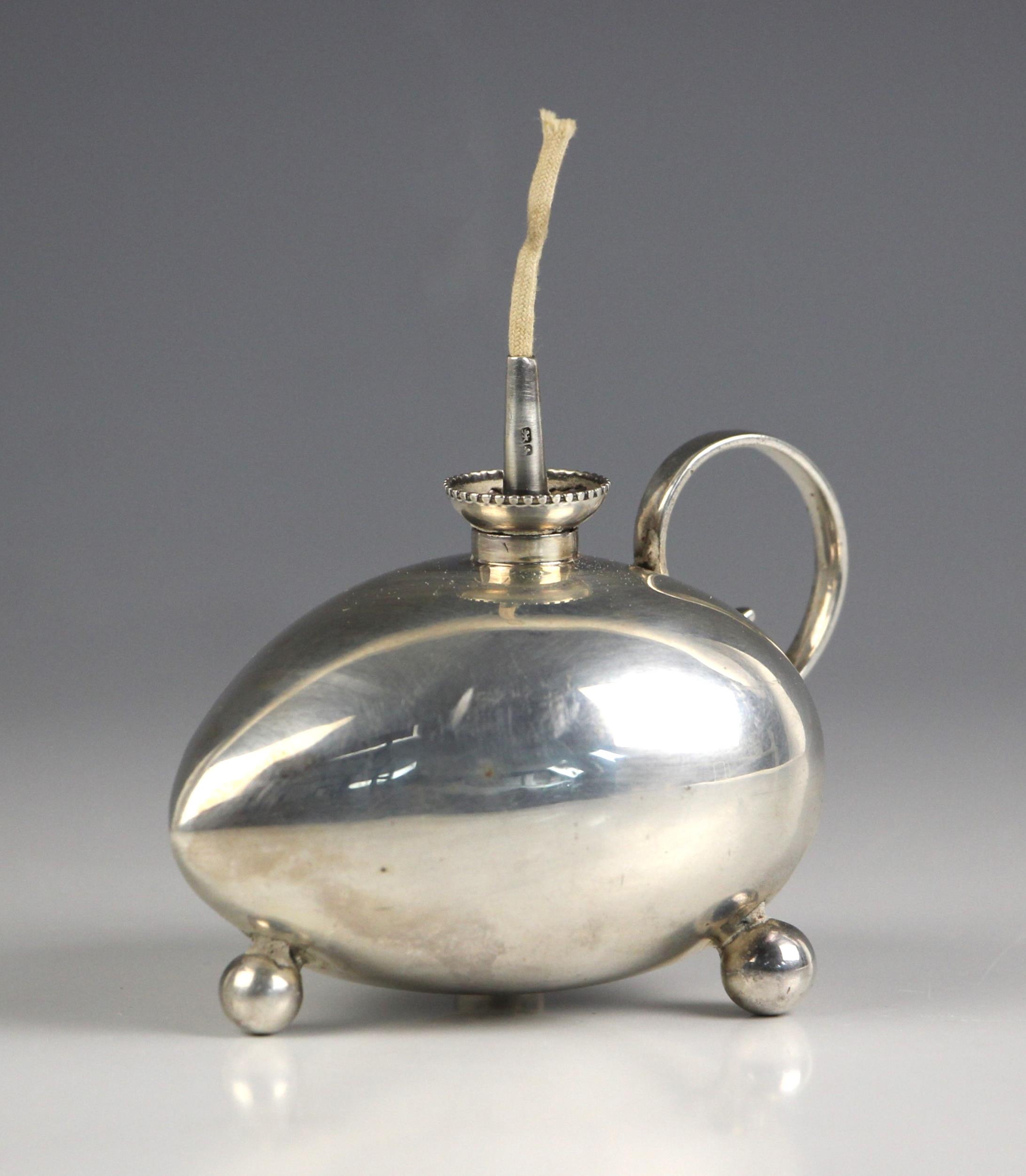 A Victorian novelty silver table lighter, James Deakin and Sons, Chester 1900, the heart shaped body