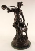 After Hippolyte-Francois Moreau (French, 1832-1927), a patinated bronze group modelled as a huntsman