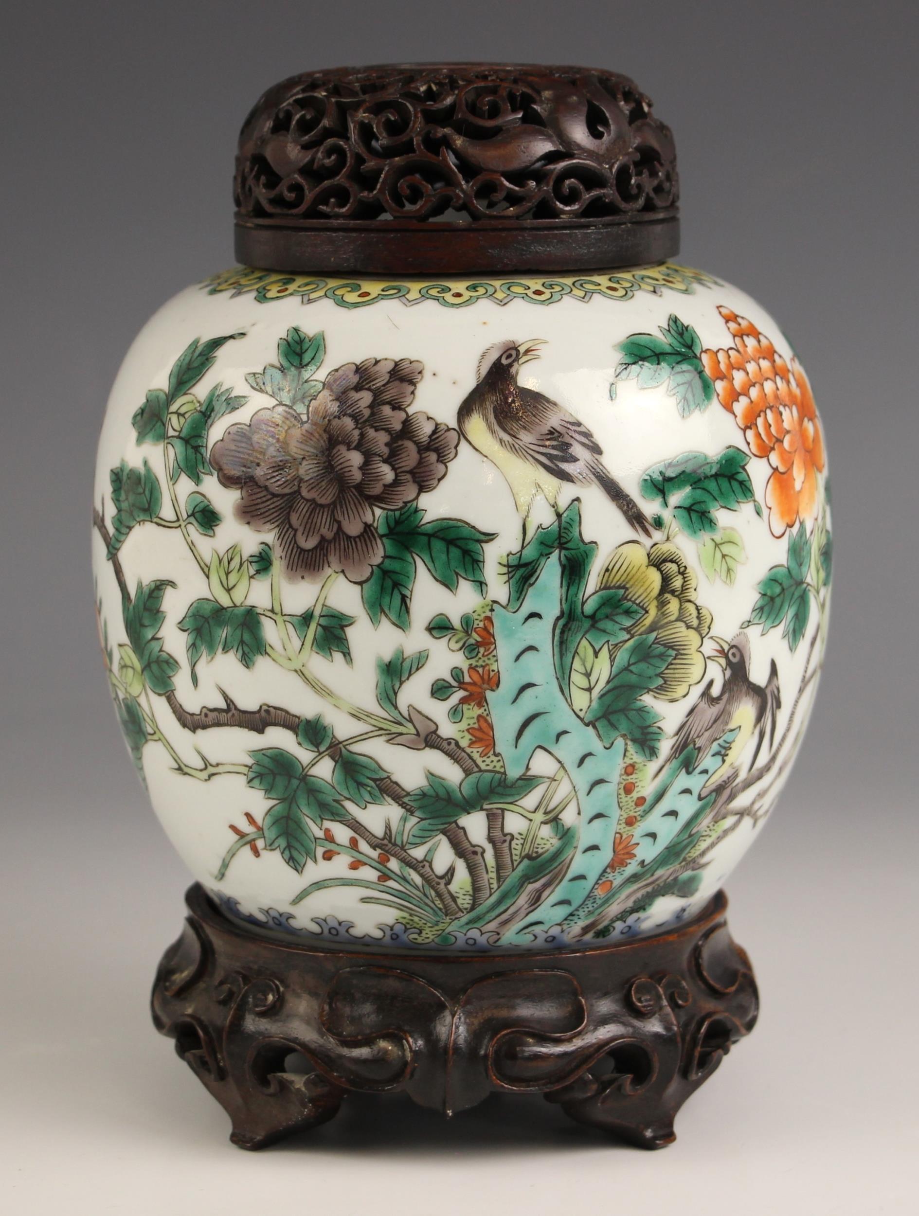 A Chinese porcelain famille vert ginger jar, cover, and stand, 19th century, the ovoid ginger jar