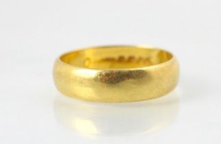 A 22ct yellow gold wedding band, stamped ‘BW&Sn’ London 1972, ring size P ½, 5.7gms