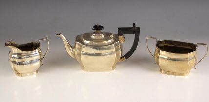 A George V silver three piece tea service, Joseph Gloster Ltd, Birmingham 1929, comprising a tea