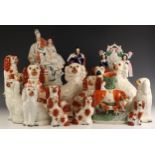 A selection of Staffordshire pottery, predominantly 19th century, to include a flat back figure of a