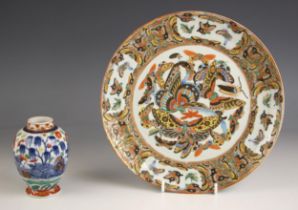 A Chinese Canton porcelain plate, 19th century, of circular form and extensively decorated with an