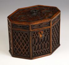 A George III mahogany blind fretwork tea caddy, of octagonal form, outlined with chequered