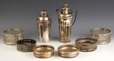 A selection of silver plated items, including a pair of silver plated bottle coasters, of openwork