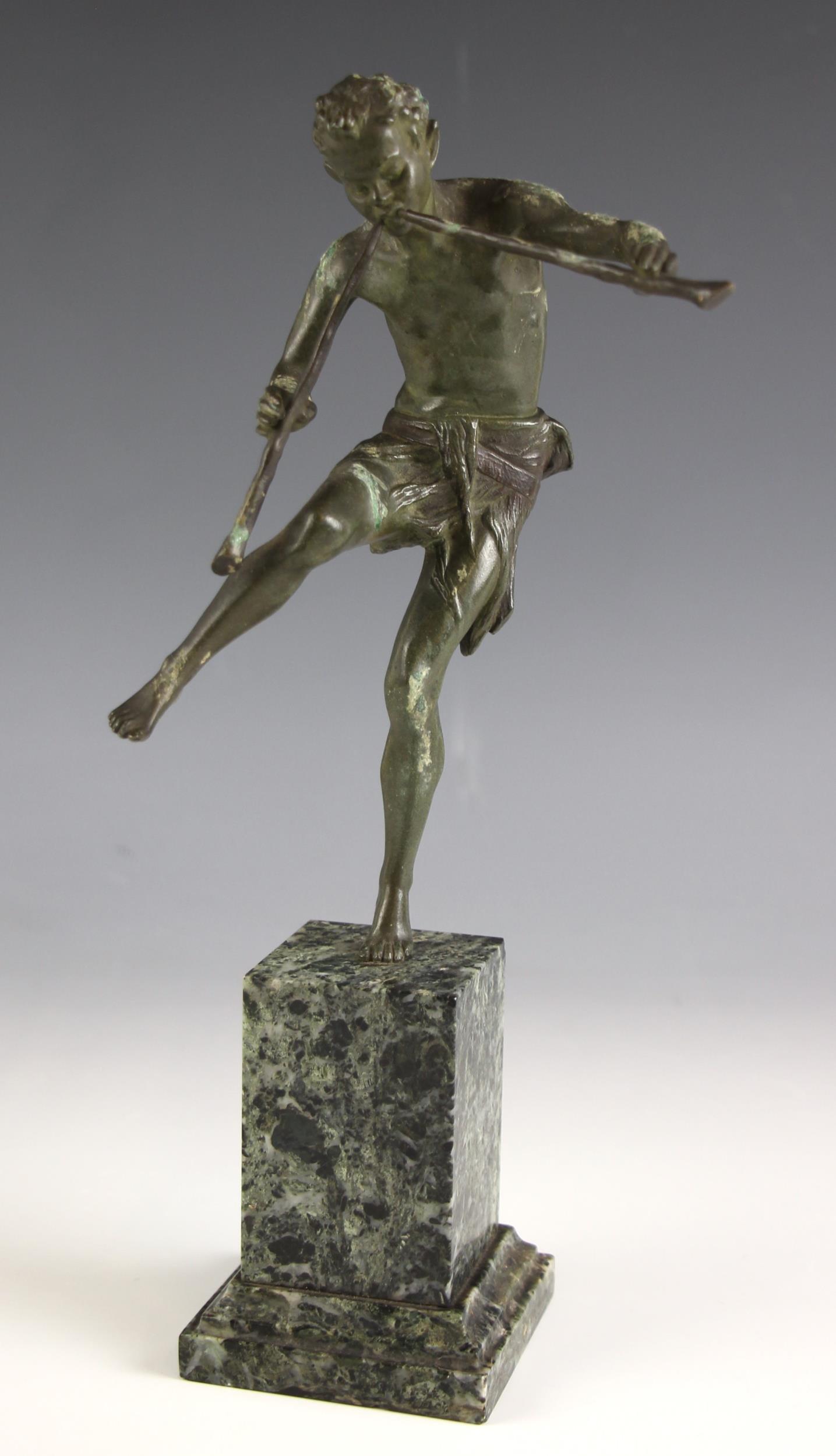 Edward Drouot (French, 1859-1945), a patinated bronze figure modelled as a satyr on one leg