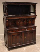 A Welsh oak Cwpwrdd Tridarn, North Wales, early to mid 18th century, the upper tier with a moulded