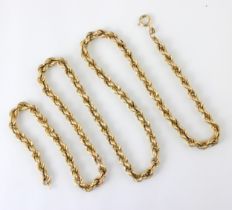 A 9ct yellow gold rope twist necklace, the bolt ring stamped with import marks, 64cm long, 15gms