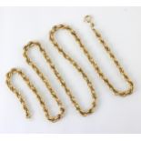 A 9ct yellow gold rope twist necklace, the bolt ring stamped with import marks, 64cm long, 15gms