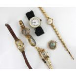 A group of early 20th century ladies yellow metal cased wristwatches, including a yellow metal