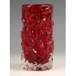A Geoffrey Baxter for Whitefriars ruby red glass 'bark' vase, of cylindrical form with bark textured