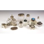 A selection of silver mounted table and vanity items, including a George V silver mounted open salt,