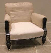 A Victorian Aesthetic Movement armchair, the padded arms enclosing a gently bowed sprung seat,