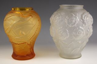 A Czechoslovakian pressed amber glass vase, mid 20th century, of inverted baluster form, the body