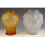 A Czechoslovakian pressed amber glass vase, mid 20th century, of inverted baluster form, the body