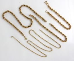 A selection of yellow metal jewellery, including two similar yellow metal rope twist bracelets, with