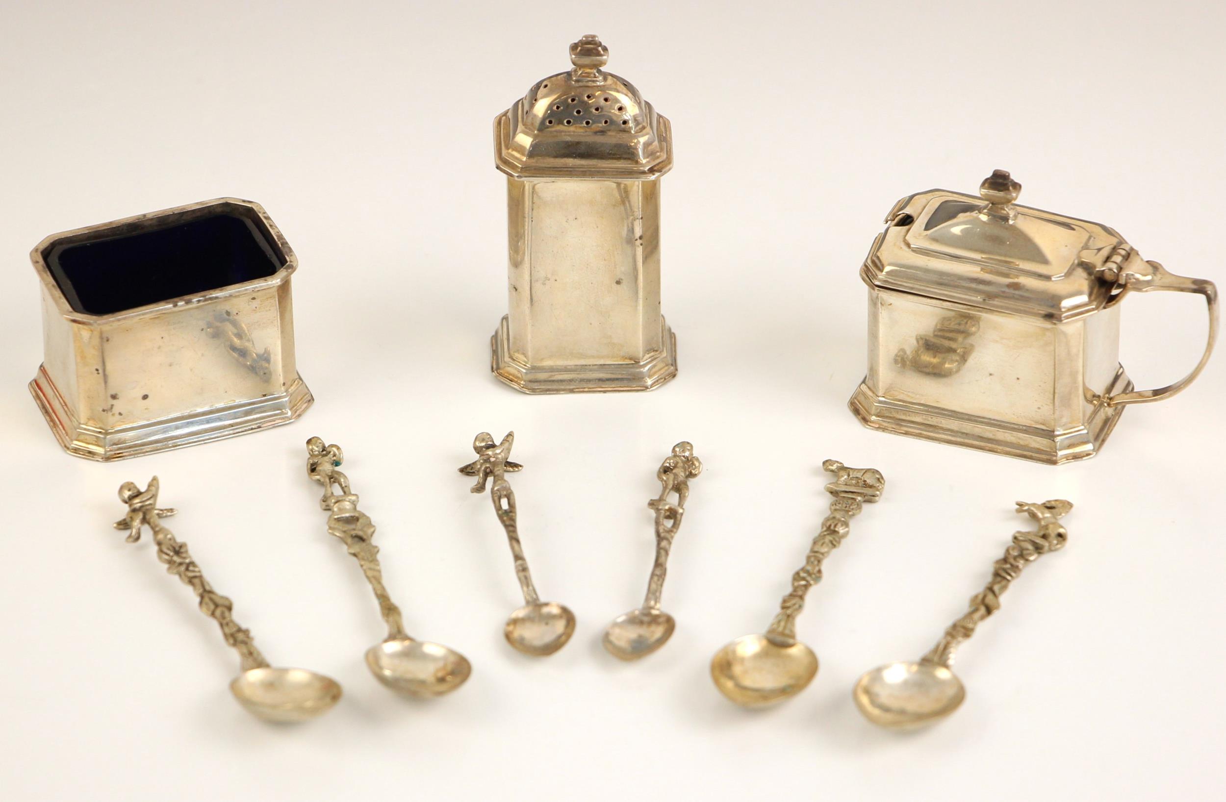 A George V silver condiment set, Elkington and Co, Birmingham 1936, comprising open salt, wet