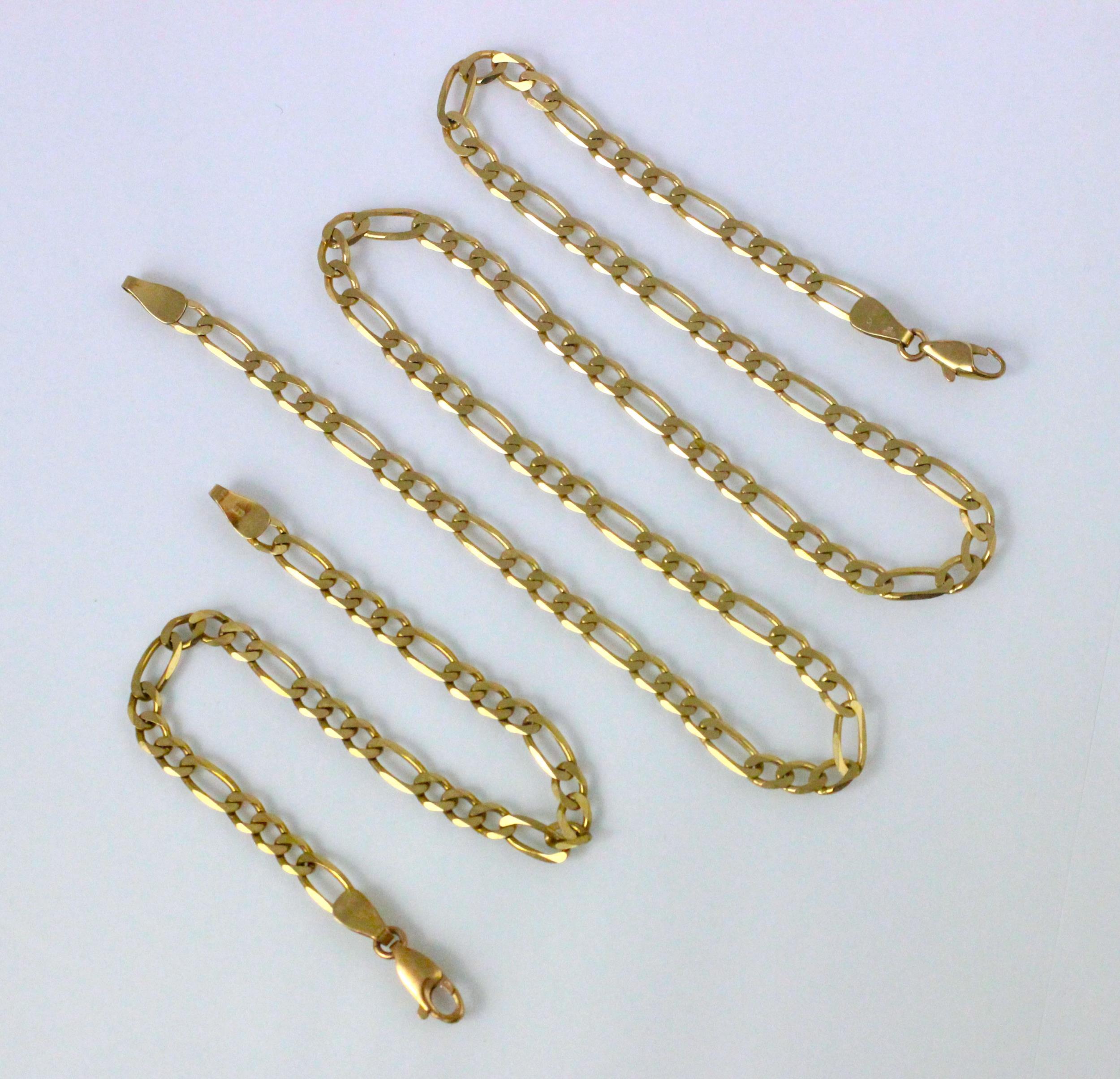 A 9ct yellow gold figaro chain, stamped with import marks, 46cm long, with a conforming bracelet,