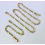 A 9ct yellow gold figaro chain, stamped with import marks, 46cm long, with a conforming bracelet,