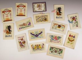 A collection of postcards to include World War I and later embroidered silk examples, comic examples