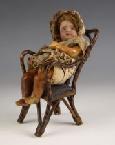 A French SFBJ bisque head doll, 19th century, modelled as a young child, the head with painted