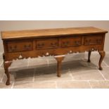 A honey oak dresser base, in the Georgian style, by Oakwood of Chester, late 20th/early 21st