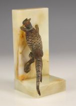 An Art Deco Austrian cold painted bronze bookend, modelled as a pheasant perched on a branch, 20th