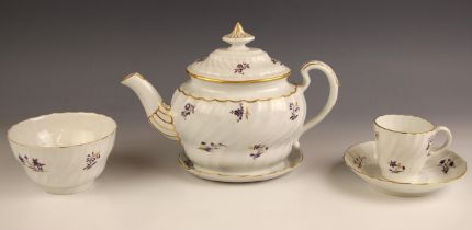 A late 18th century porcelain teapot, cover and stand, probably Worcester circa 1795, of wrythen