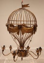 A 20th century gilt metal hanging ceiling light, modelled as a hot air balloon, over six scrolled '