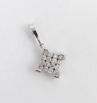 A diamond set 9ct white gold pendant, the square shaped pendant set with sixteen pave set round