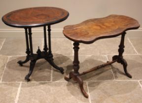 A Victorian ebonised and amboyna occasional table, the oval quarter veneered top with an ebonised