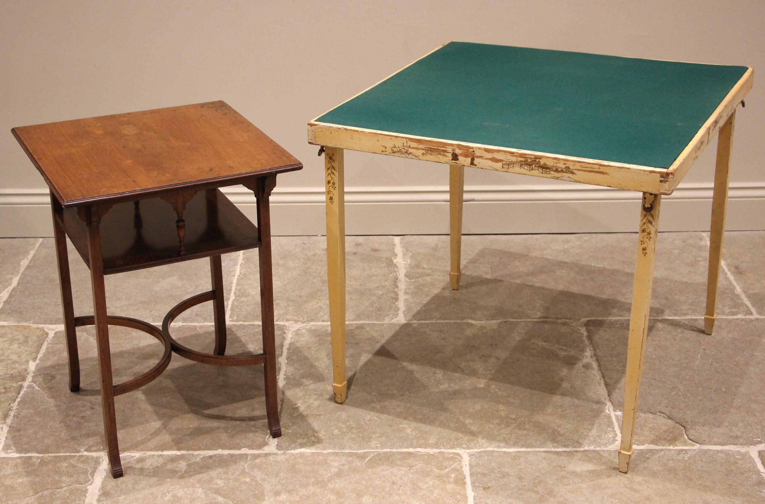 An Edwardian mahogany occasional/lamp table, the moulded square top over an arcaded under tier, upon