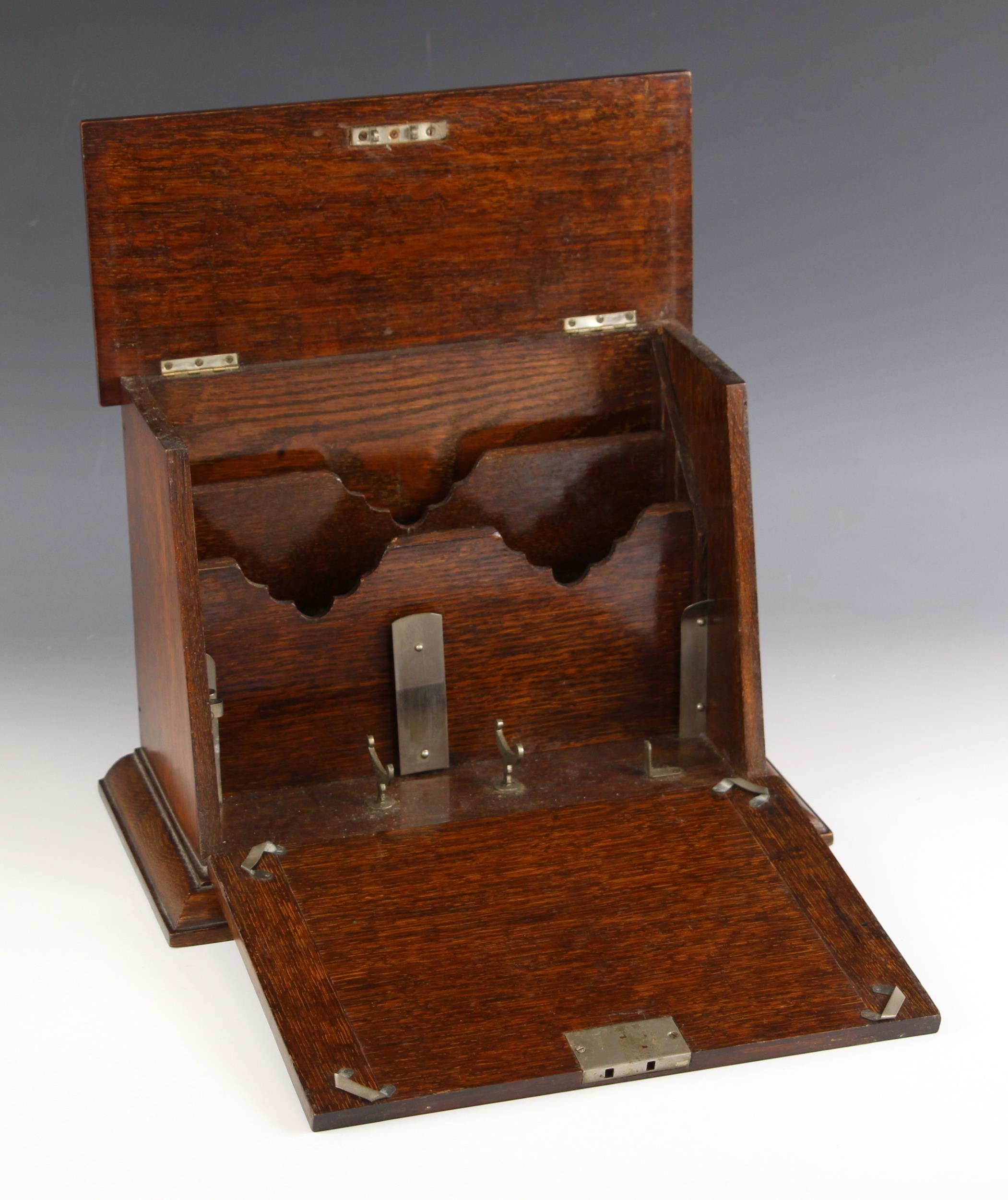 An Edwardian oak and inlaid stationary cabinet, the hinged top and fall front centred with an inlaid - Image 2 of 2