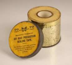 WORLD WAR II INTEREST: A tin of Butterfly Brand Air Raid Precaution Sealing Tape, 70 feet long,