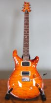 A 2010 PRS custom 24 electric guitar, Made in USA, serial number 10159179, finished in a sunburst