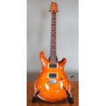 A 2010 PRS custom 24 electric guitar, Made in USA, serial number 10159179, finished in a sunburst