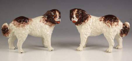 A pair of Staffordshire St Bernard dogs, 19th century, each modelled standing with naturalistic