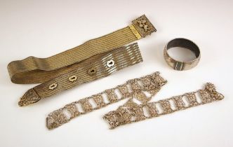 A selection of silver and silver coloured items, including an Edwardian belt, designed as panels