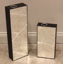 A contemporary mirrored candle holder or posy vase, the rectangular case with mirrored front panel