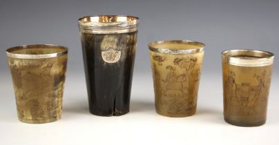 Three early 19th century engraved horn cups, the tapered cups with silver mounted rims above naively