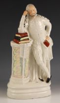 A large Victorian Staffordshire figure of William Shakespeare, mid 19th century, loosely modelled