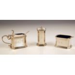 A George VI silver condiment set, Mappin and Webb, London 1938, comprising wet mustard, open salt