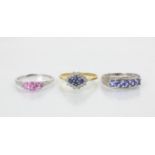 A group of three rings, including a 9ct white gold untested pink sapphire ring, the three