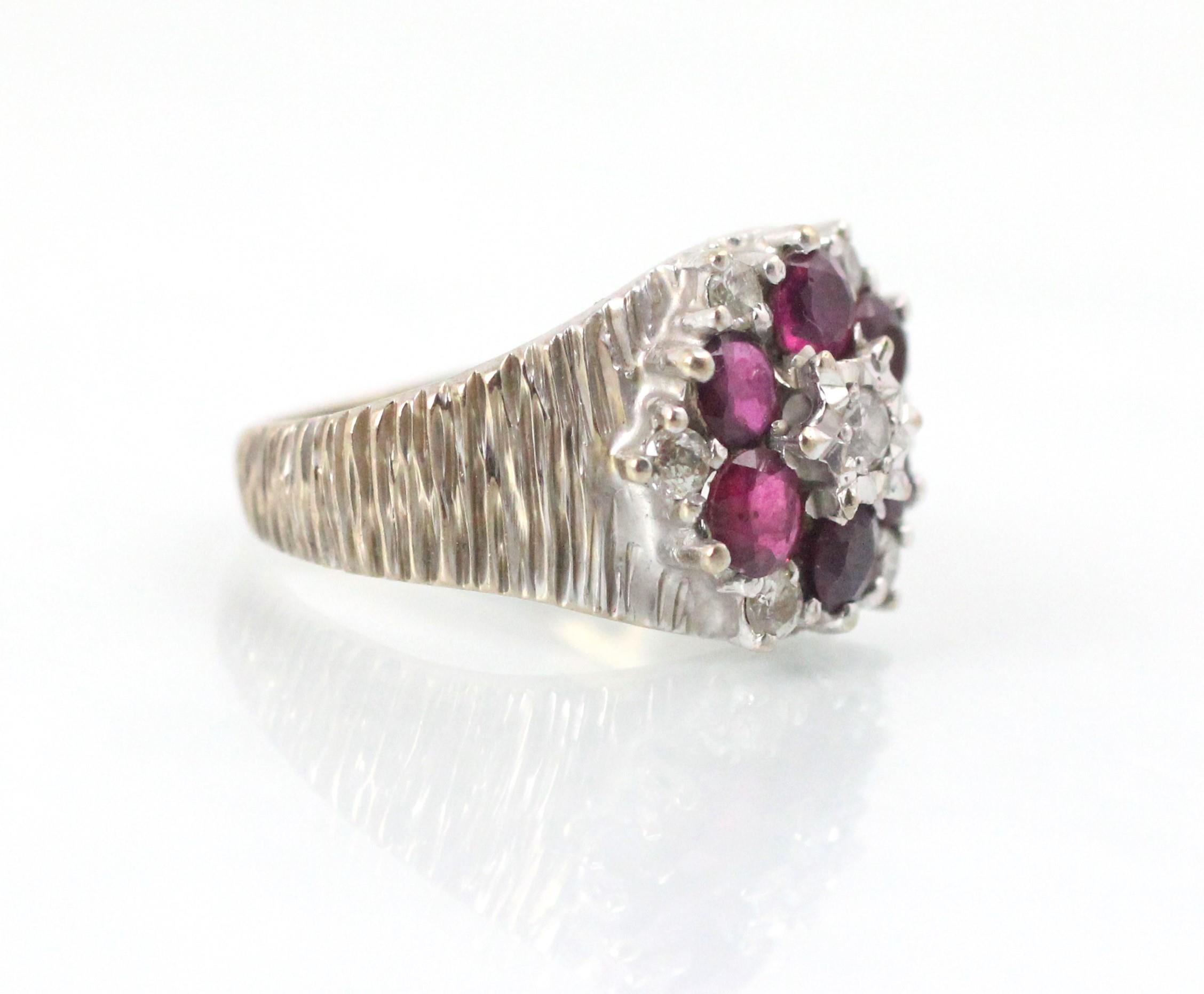 An 18ct white gold untested ruby and diamond cluster ring, the central round cut diamond with - Image 2 of 3